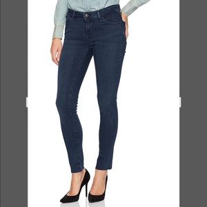 25 Levi’s 711 Dark Wash Skinny Jeans with Raw Hem